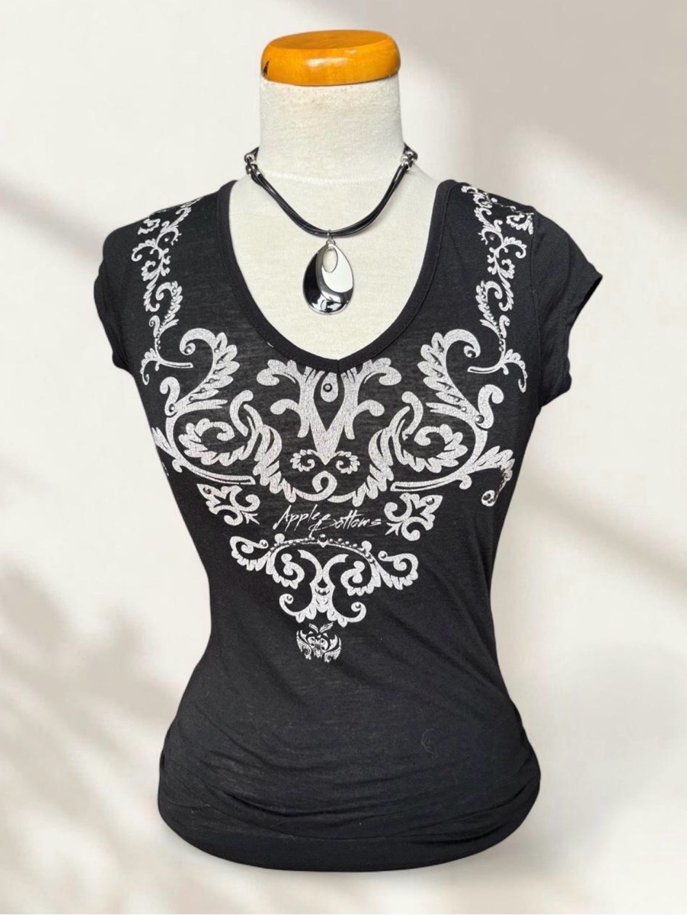 Apple Bottoms Black Short-Sleeve V-Neck Top with White Ornate Graphic